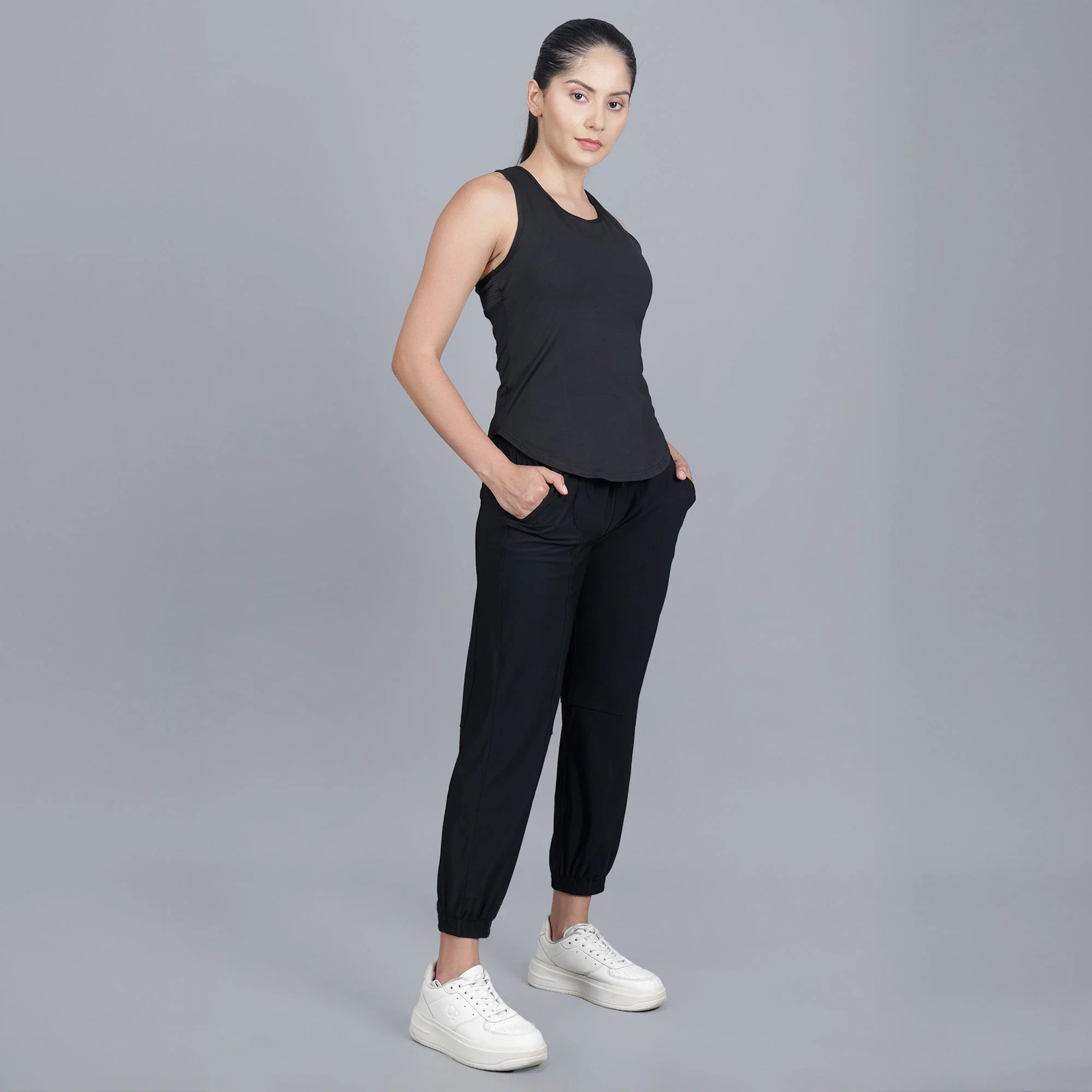 Chiclo Women's Athleisure Trio Set - Joggers, Sports Bra, and Vest - Image 8