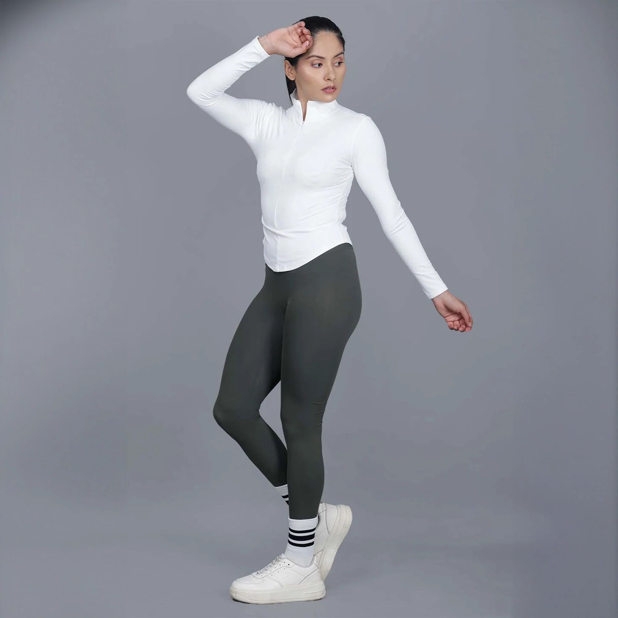 Chiclo Women's Set Featuring Green Tights, White Dri-fit T-shirt & Socks - Image 2