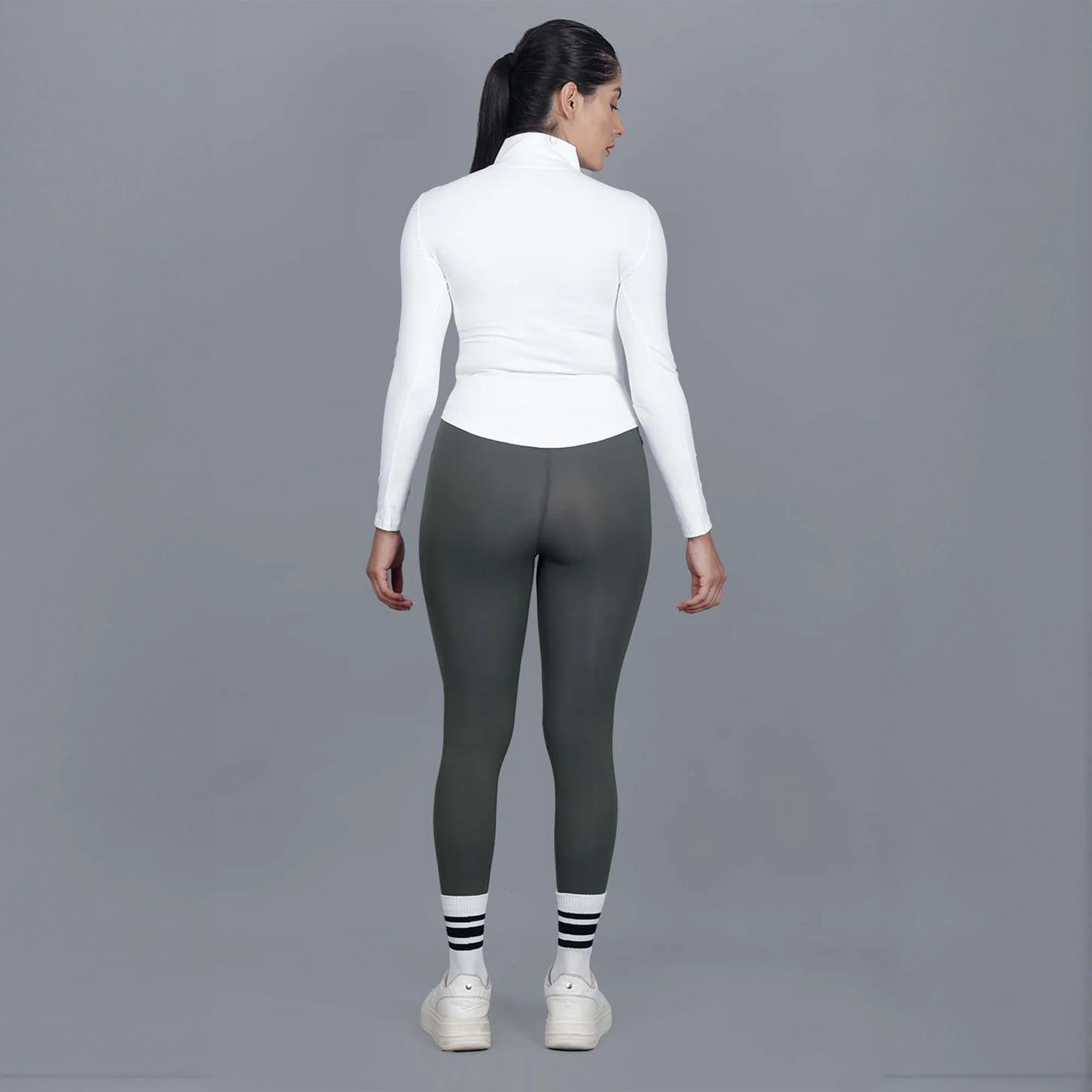 Chiclo Women's Set Featuring Green Tights, White Dri-fit T-shirt & Socks - Image 6